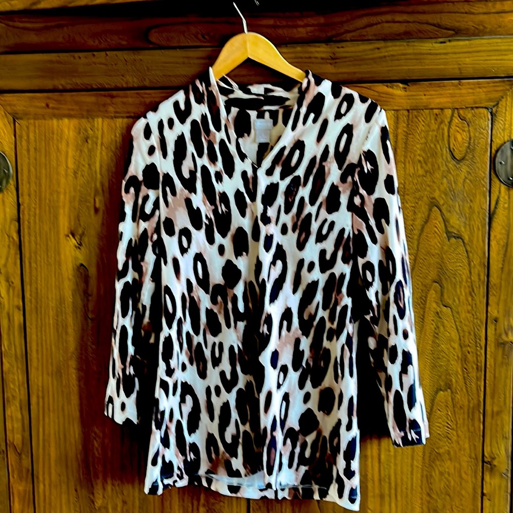 Chico’s leopard print tunic top . Size 0 which is comparable to a small medium